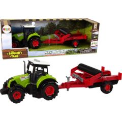 Bērnu traktors ar sarkanu piekabi