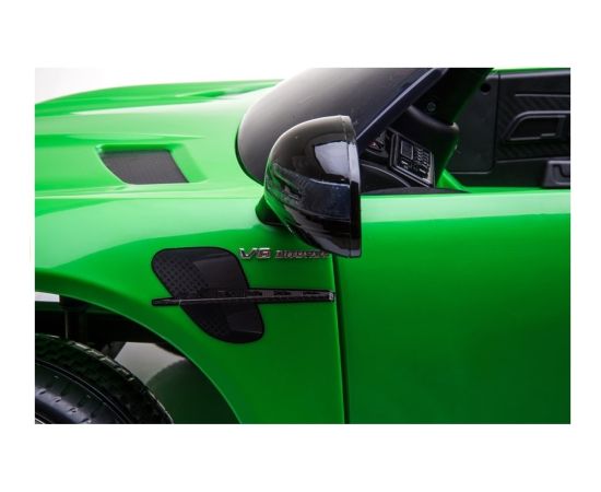 Mercedes GTR elektriskais vienvietīgais pasažieru automobilis, zaļš