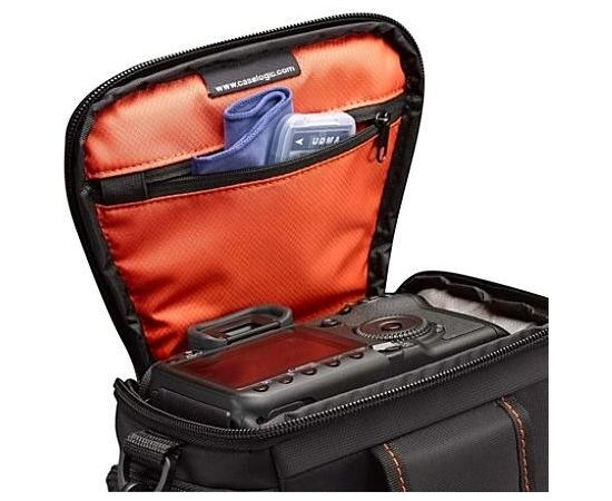 Case Logic DCB-306 Black, * Designed to fit an SLR camera with standard zoom lens attached * Internal zippered pocket stores memory cards, filter or lens cloth * Side zippered pockets store an extra battery, cables, lens cap, or small accessories * Lid un