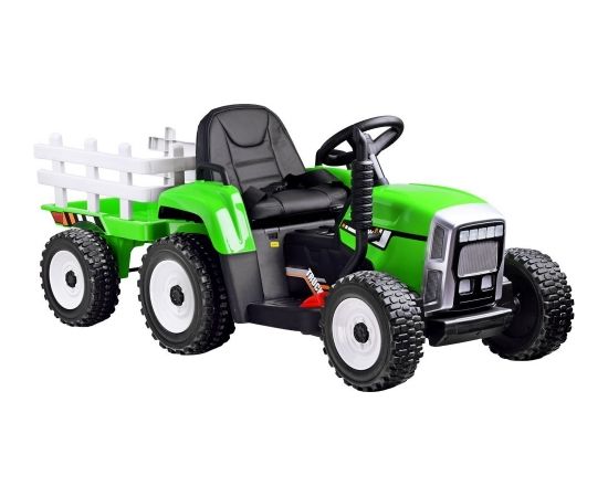 Liels elektriskais traktors ar piekabi, zaļš